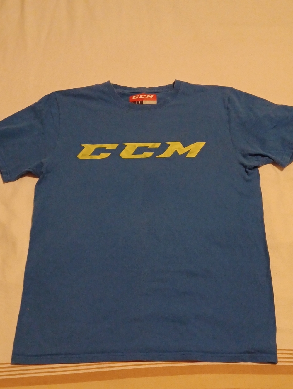 CCM Blue Short Sleeve Tee with Yellow Logo